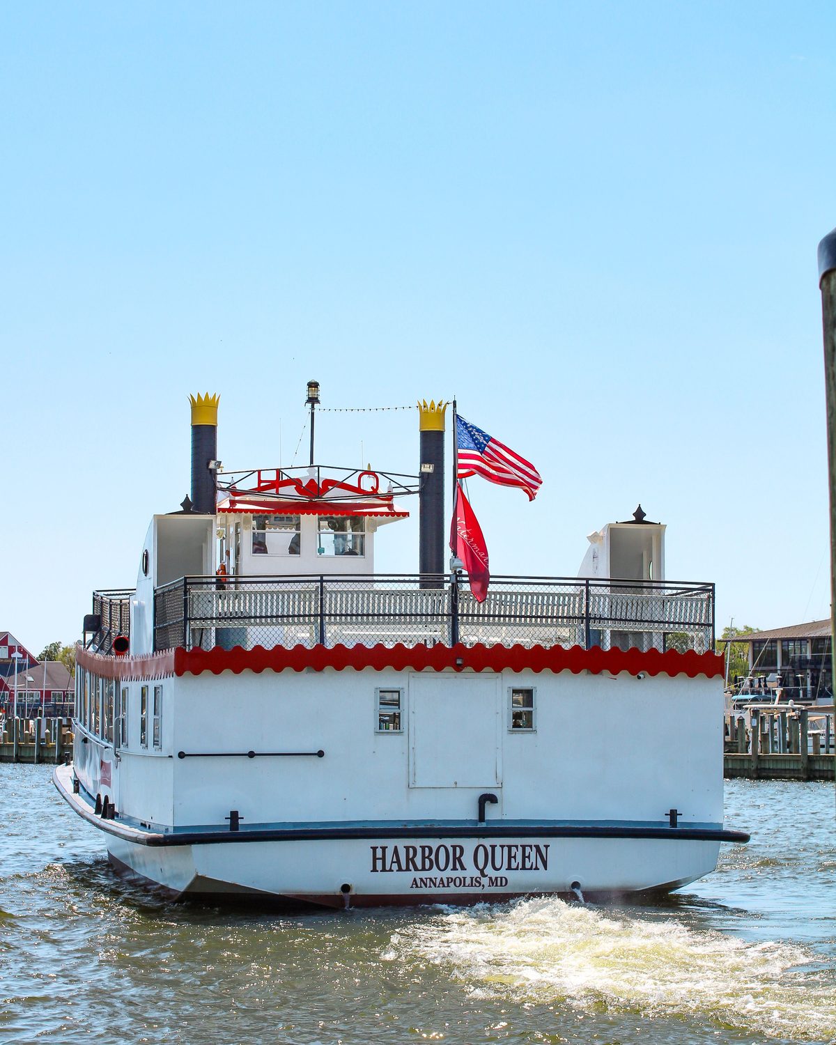 An American flag flying in a strong wind
